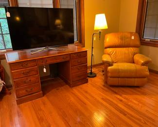 Desks, TV's and leather recliners