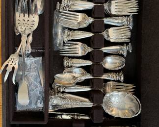 Wallace Seaside Sterling Silver 5 - Piece Place Setting for 14 (9 Serving Pieces)
Dinner Knife - 14
Spoon - 14
Soup Spoon 14
Dinner Forks - 13
Salad Forks - 14
Serving Spoons - 2
Canapé Serving Pieces 2
Serving Ladle
Serving Forks - 2
Slotted Spoon
Cake Server