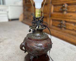 Antique Asian Bronze Table Lamp with Elephant Motif. Photo 1 of 2.