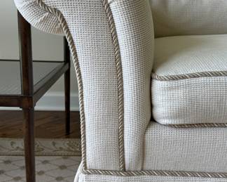 Vintage Beacon Hill Showroom Three Seat Down-Filled Sofa Upholstered in Neutral Fabric With Contrasting Welting. Photo 2 of 4.