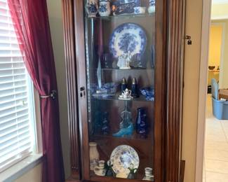Glass front display cabinet with hidden gun cabinet 