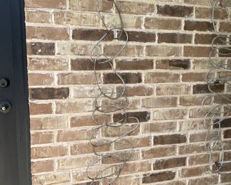 Chain link art on outside wall