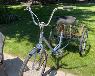 Three wheeler bicycle with basket 