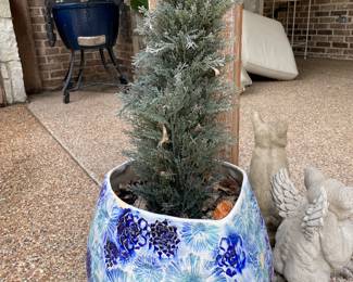 Decorative pot with plant 