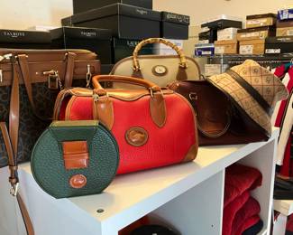 Calvin Kline, Dooney & Bourke, Liz Claiborne, Fendi and other quality purses, scarves and hats