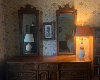 Grand wooden dresser with attached mirrors