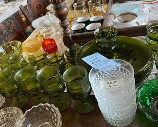 Table full of vintage glass