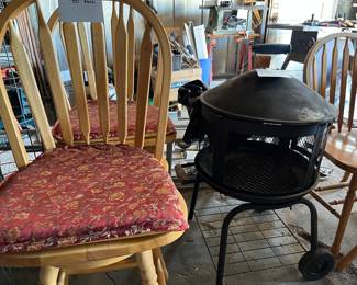 Tall oak chairs and wood burner