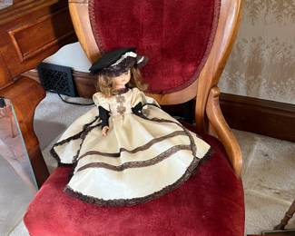 Vintage chair and vintage doll