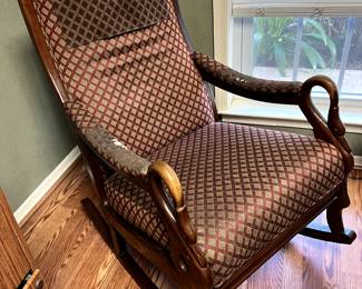 Goose head rocker. Fabric is worn on the arms