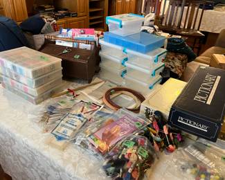 DMC Embroidery Floss, seed beads, kits, cloth, and containers