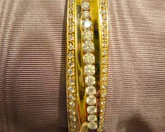 14 karat and diamond hinged bangle bracelet approximately 2.25 carats diamonds