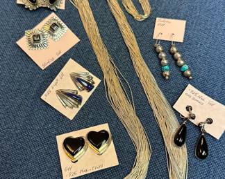 Liquid silver necklace and bracelet and sterling earrings.