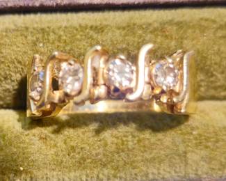14 karat and diamond ring made from a portion of an S link tennis bracelet
