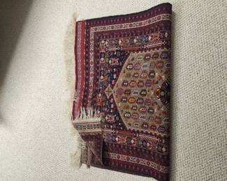 Back of the rug. Bright colors, excellent condition 