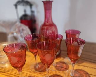 Cranberry red crystal, cut glass decanter with glasses