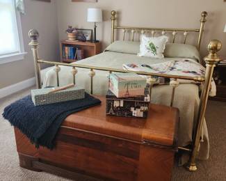Brass queen bed set, art deco era trunk, assorted quilts