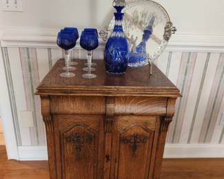 Antique wood sewing cabinet was repurposed as a bar. Cobalt crystal decanter w stemware glasses. Ercole Barovier 1940's Italian Murano Twisted Glass Engraved Serving Tray Mirror