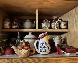 Decorative teapots, cookie jars and other kitchenware.