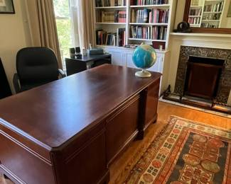 old books and a fantastic antique Oriental Rug