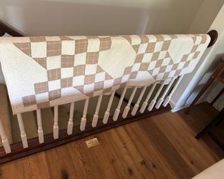 Several hand-crafted quilts