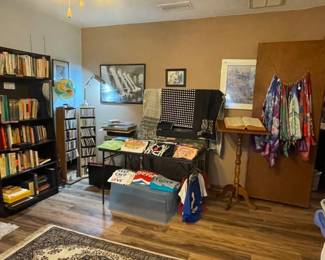 More books! And scarves, and electronics that probably work but we won’t have the time to test so you’ll have to make an offer…Scarves! T-shirts! CD’s! And that awesome vintage lighted globe..