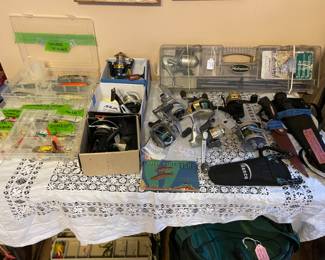 Nice assortment of fishing reels and other pieces of equipment along with the freshwater lures.