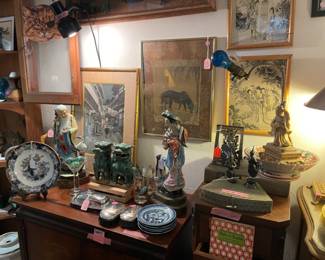 The Asian table has some unique pieces. A few boo-boos on the vintage pieces but they still manage to shine.