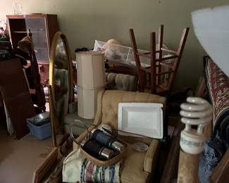 A room packed full of cool stuff!!  We still have this room to empty and stage. 