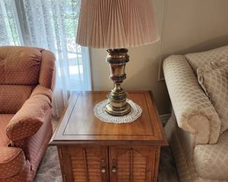 End table and a heavy brass lamp