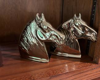 BRASS HORSE HEAD BOOKENDS.