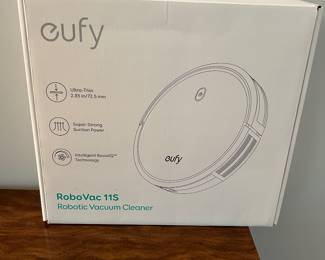 ROBOT VACUUM STILL IN THE BOX.