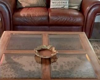 Leather loveseat and coffee table