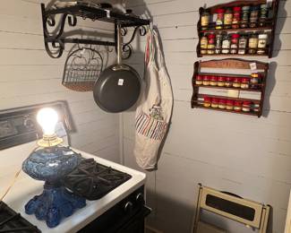 Blue glass lamp, pot rack, spice racks