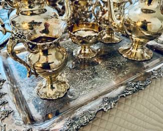 Silver tea set with matching punch bowl