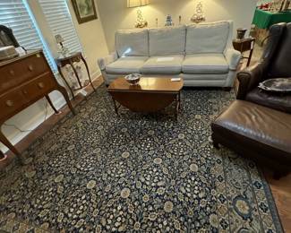 Gorgeous antique rugs, Sherrill sofa, leather chair with ottoman