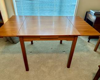 teak draw leaf table with leaves extended