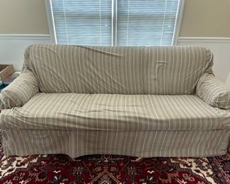 slipcovered sofa