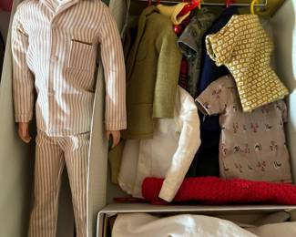 Ken doll, clothes and carrying case