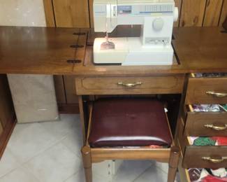 Nice sewing machine and cabinet 