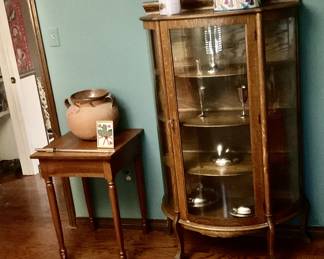 Wood table, display cabinet with curved glass
