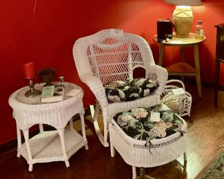 white wicker rocker, ottoman, table
