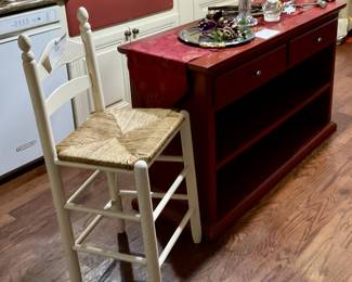 Chair red cabinet with drawers