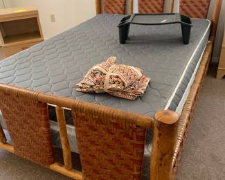 Log Pole and Leather Double Bed