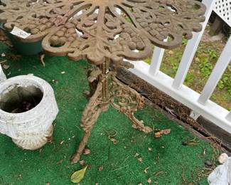 #50	Cast iron table 21x23	 $50.00 
