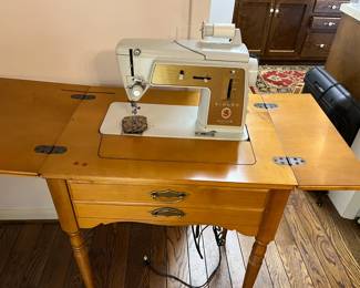 #130	Singer Touch and Sew in Cabinet	 $50.00 
