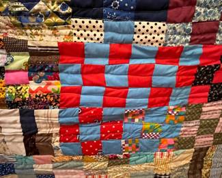 #204	Quilt completely scrappy machine quilted 70x80	 $60.00 
