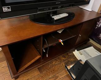 #139	Laminate TV Stand (one door is off) - 48x21x20	 $25.00 
