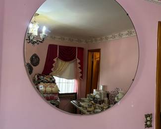 #236	mirror, 36 inches round	 $30.00 

