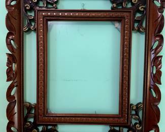 #47	Wood Carved pictured frame 22x25	 $45.00 
